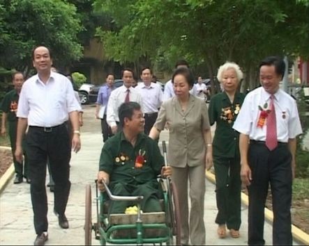 Various activities are underway to mark the 65th War Invalids and Martyrs Day - ảnh 1